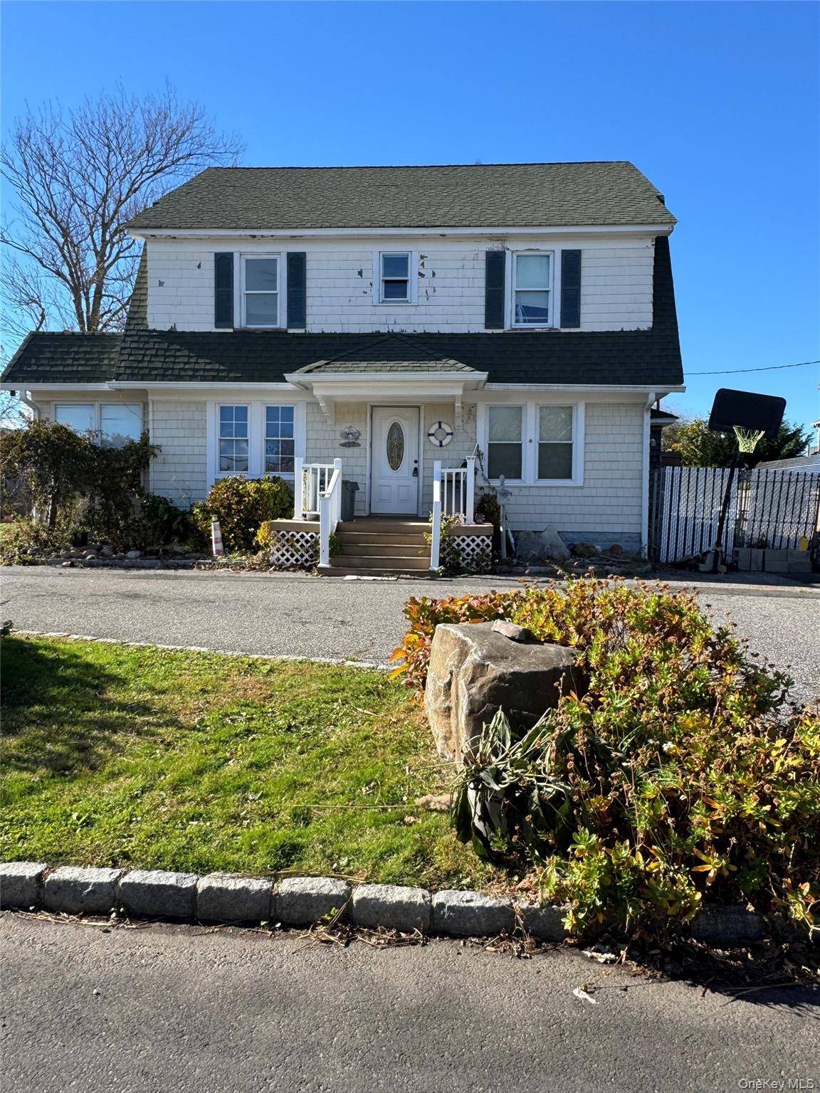Charming 5 bedroom, 3 bath colonial in the heart of Patchogue offering an incredible opportunity to bring your vision to life.