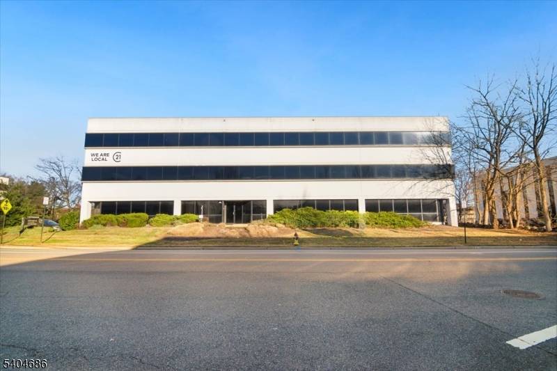 Elevate your business presence in this three story office building offering exceptional visibility and immediate access to major highways.