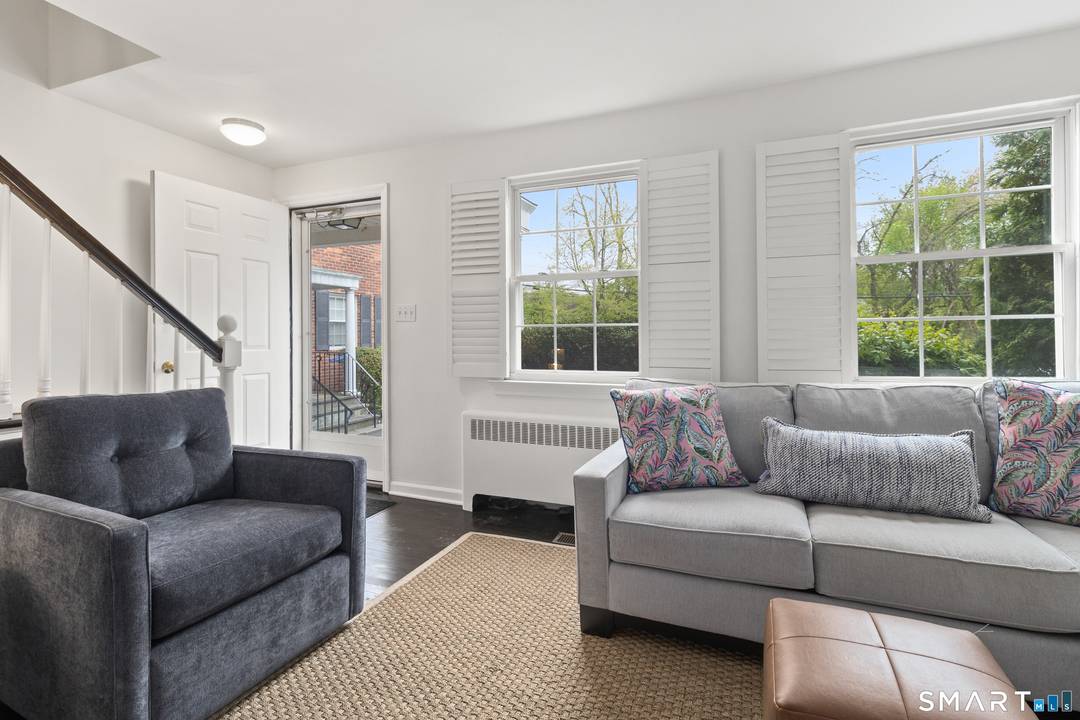 Overlooking a picturesque golf course, this beautifully updated three level townhouse offers a rare blend of space, light, and privacy in a prime Stamford location.