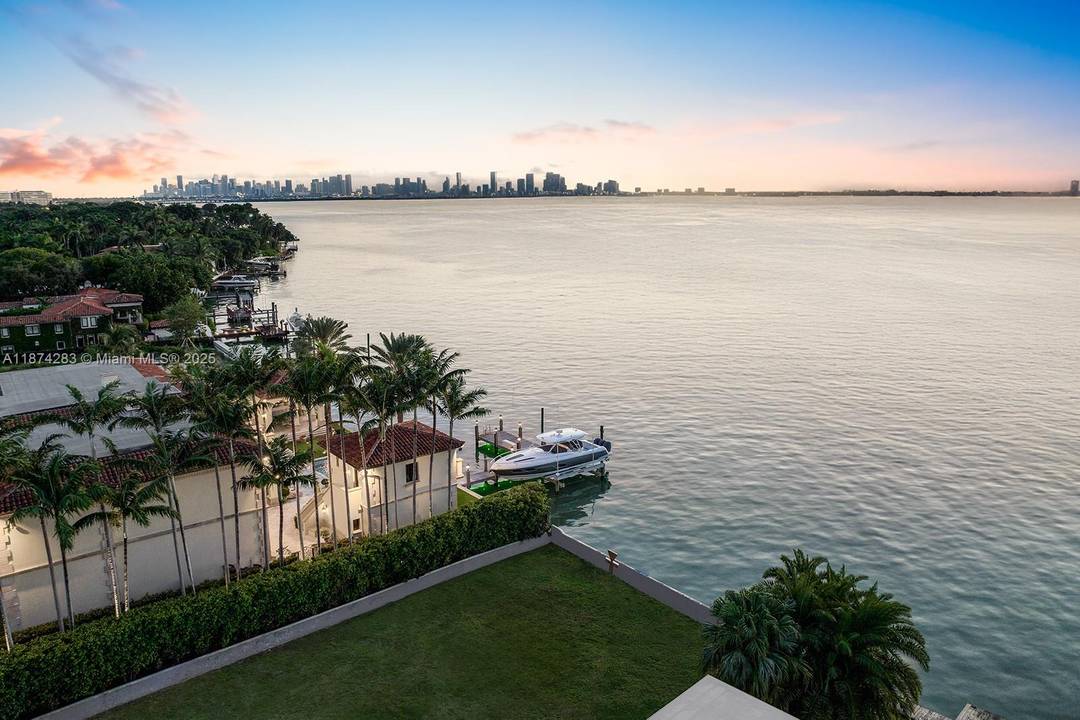 A rare opportunity to own a premier waterfront lot on prestigious North Bay Road, featuring 80 ft of water frontage, complete with approved plans, permits, and a newly built seawall.