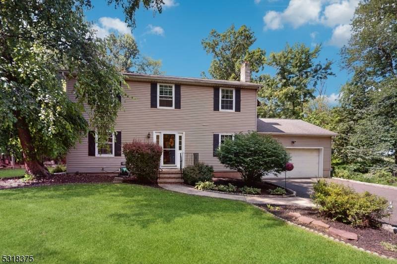 Welcome Home ! Nestled on a serene 1.