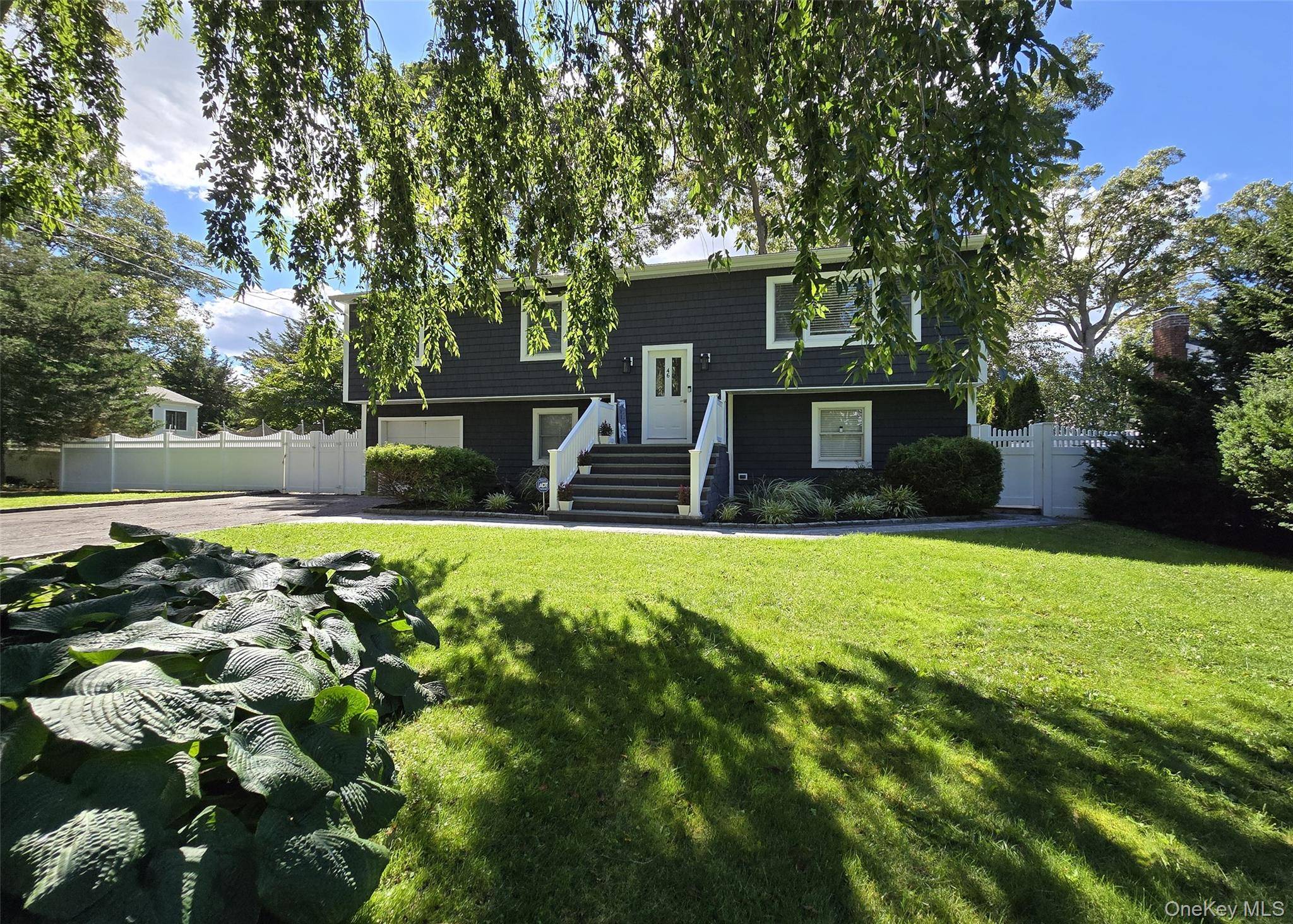 Welcome to this well maintained 5 BR, 3 full bath home offering exceptional space and versatility.