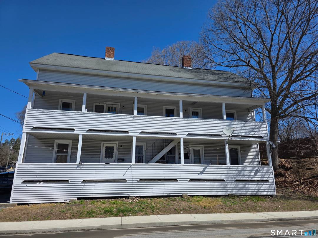 4 UNITS PLUS A 3 FAMILY ALL ON ONE PROPERTY, PLENTY OF OFF STREET PARKING, FULLY RENTED AND SOME LONG TERM TENANTS IN PLACE.