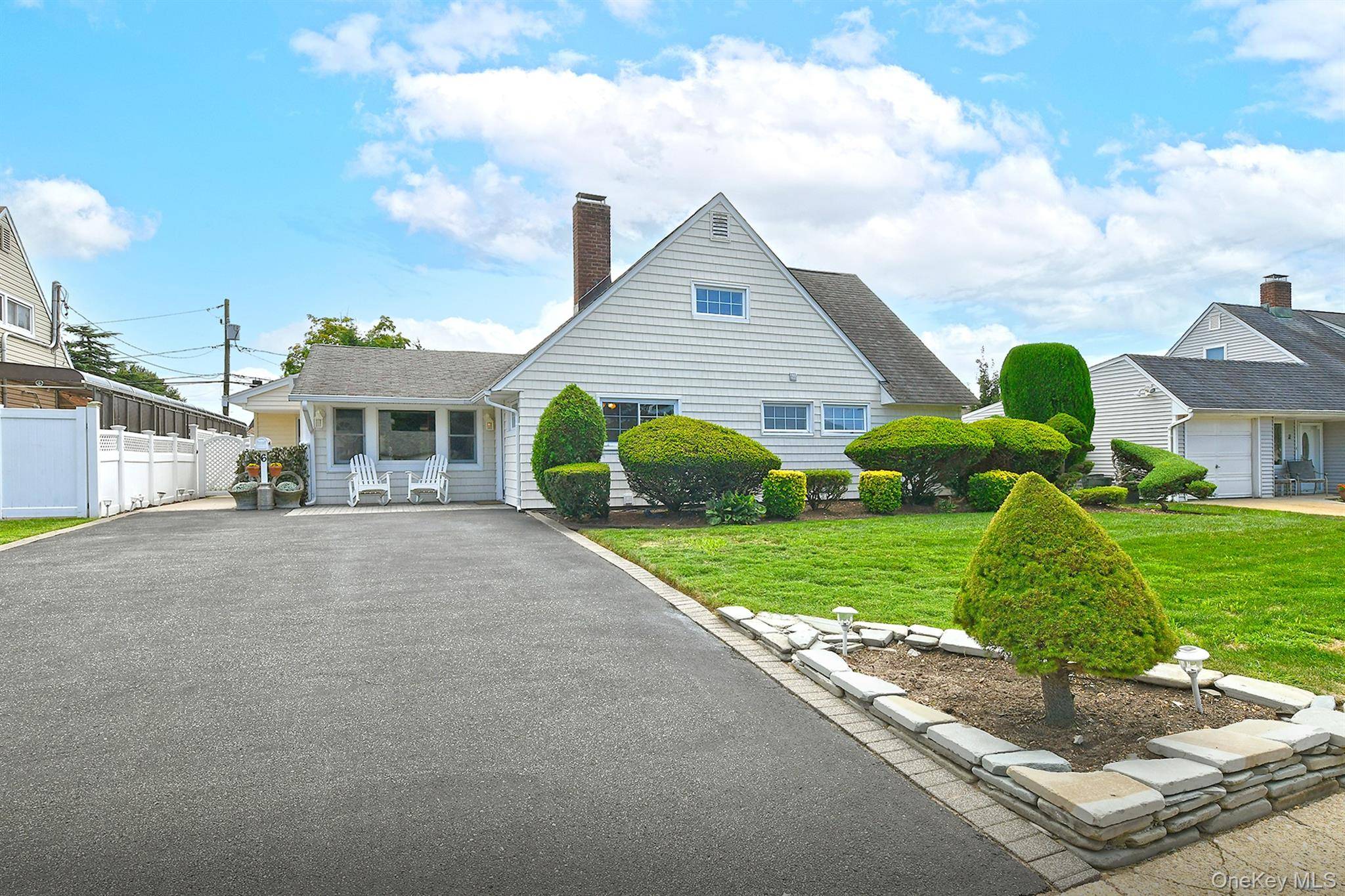 Spacious, Updated Levitt Expanded Ranch on Quiet Tree Lined Street.