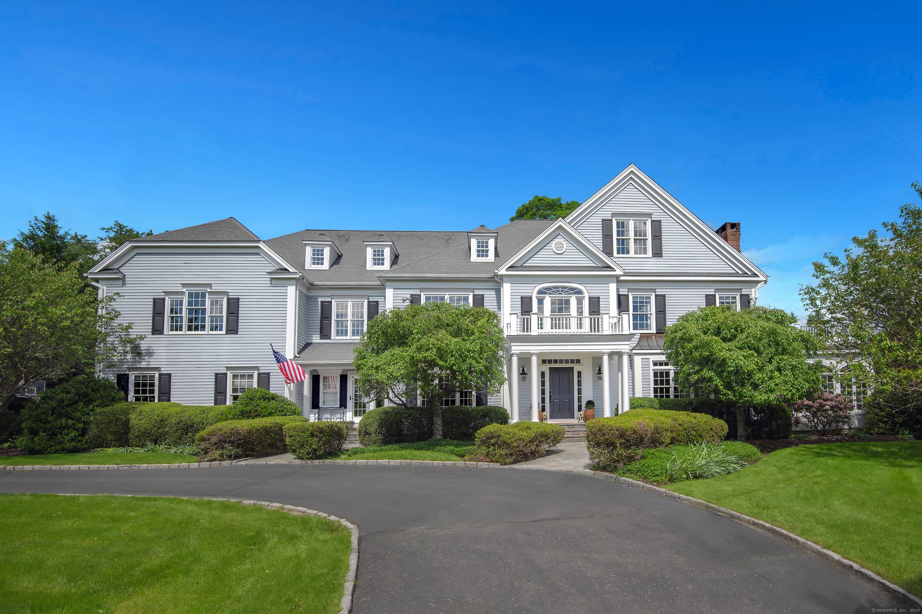 Elegantly situated in one of Fairfield County's most desirable scenic roads, this timeless estate offers luxury and privacy on two acres of park like grounds.
