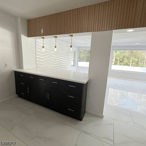 Fully Renovated Resort Style Expanded Cape Cod Welcome to this beautifully renovated, resort style Expanded Cape Cod situated on a deep property in one of the most desirable neighborhoods.