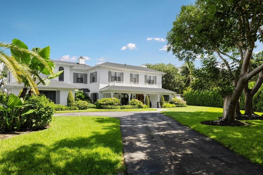 Beautifully renovated modern farmhouse in North Palmetto Bay, set on a quiet tree lined cul de sac.