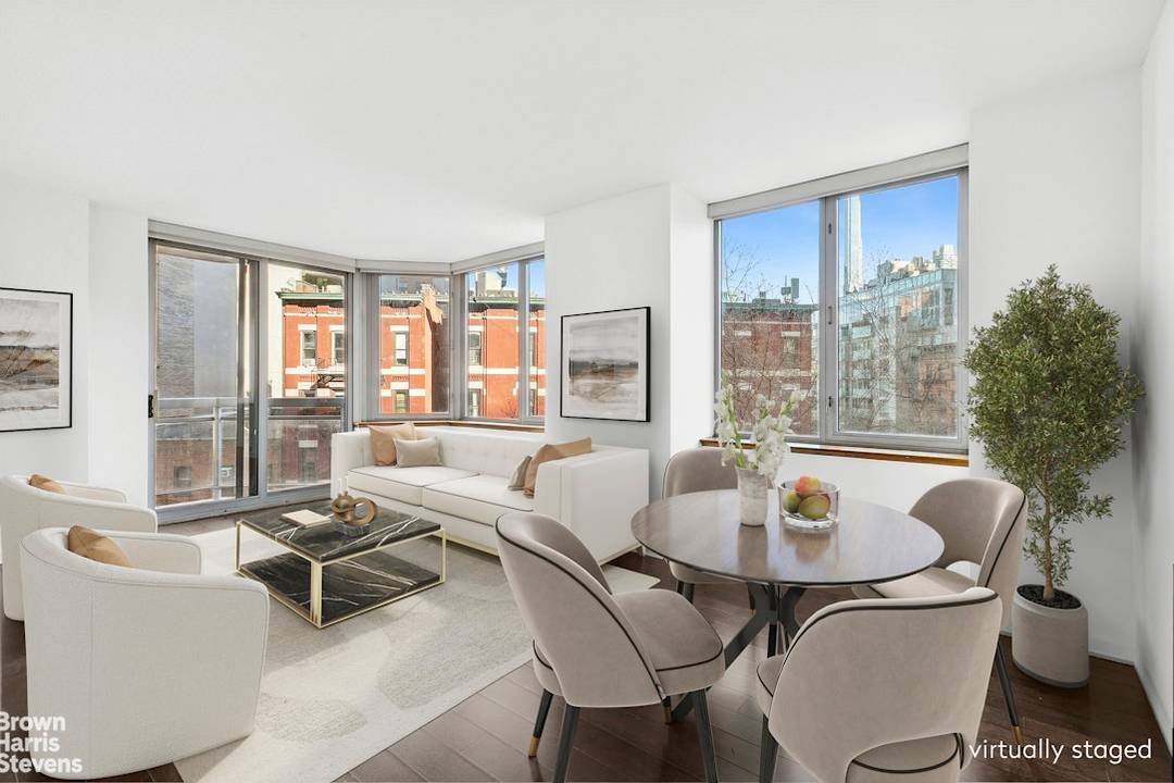 Located in The Strand, a towering diamond shaped condominium, this one bedroom, one bath residence offers expansive North and East facing windows that flood the corner of every room with ...