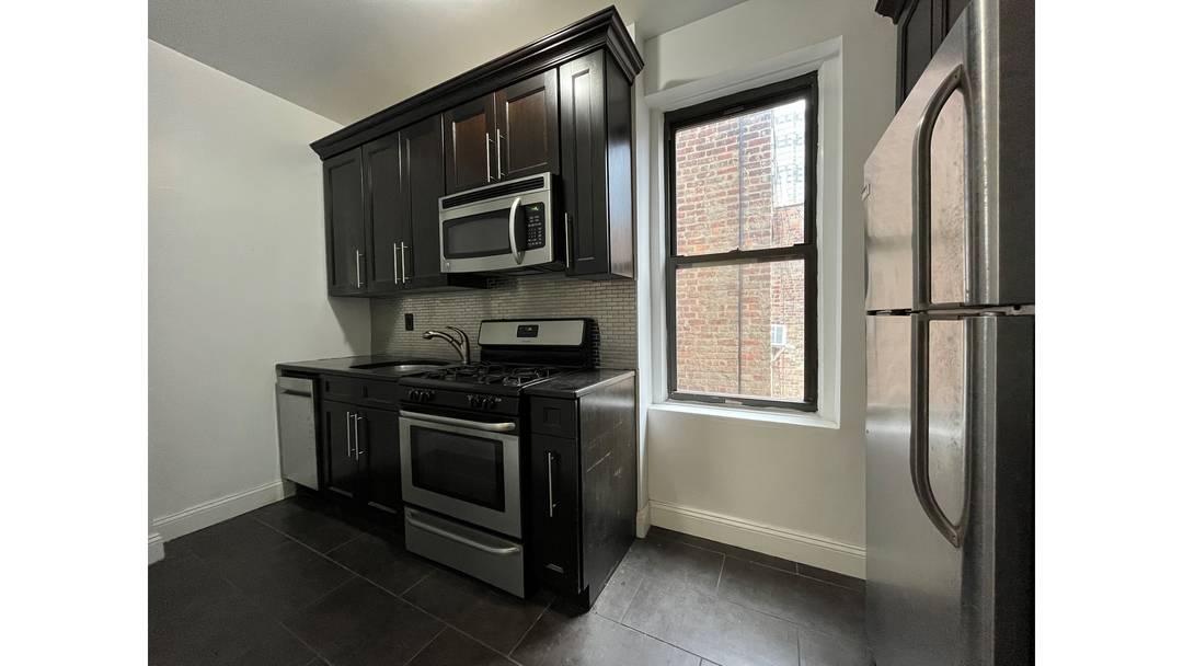 Don't miss this beautifully renovated true two bedroom apartment !