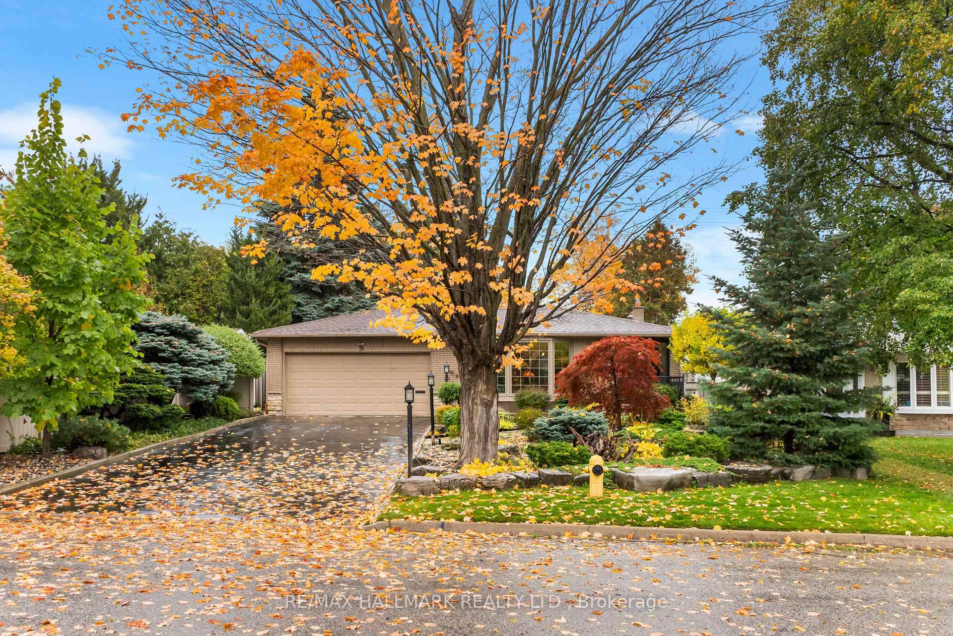 Picture perfect with undeniable curb appeal, this beautifully maintained ranch bungalow is brimming with charm and comfort.