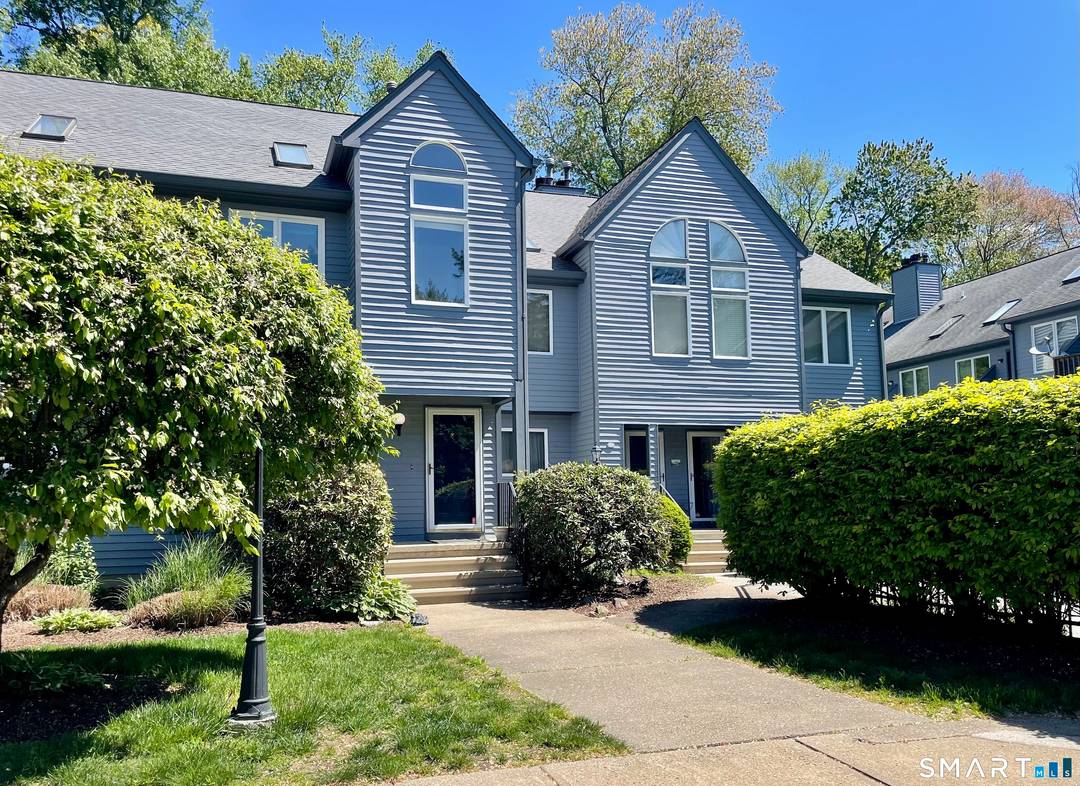 Pristine townhouse nestled in a small, well maintained complex in Norwalk.