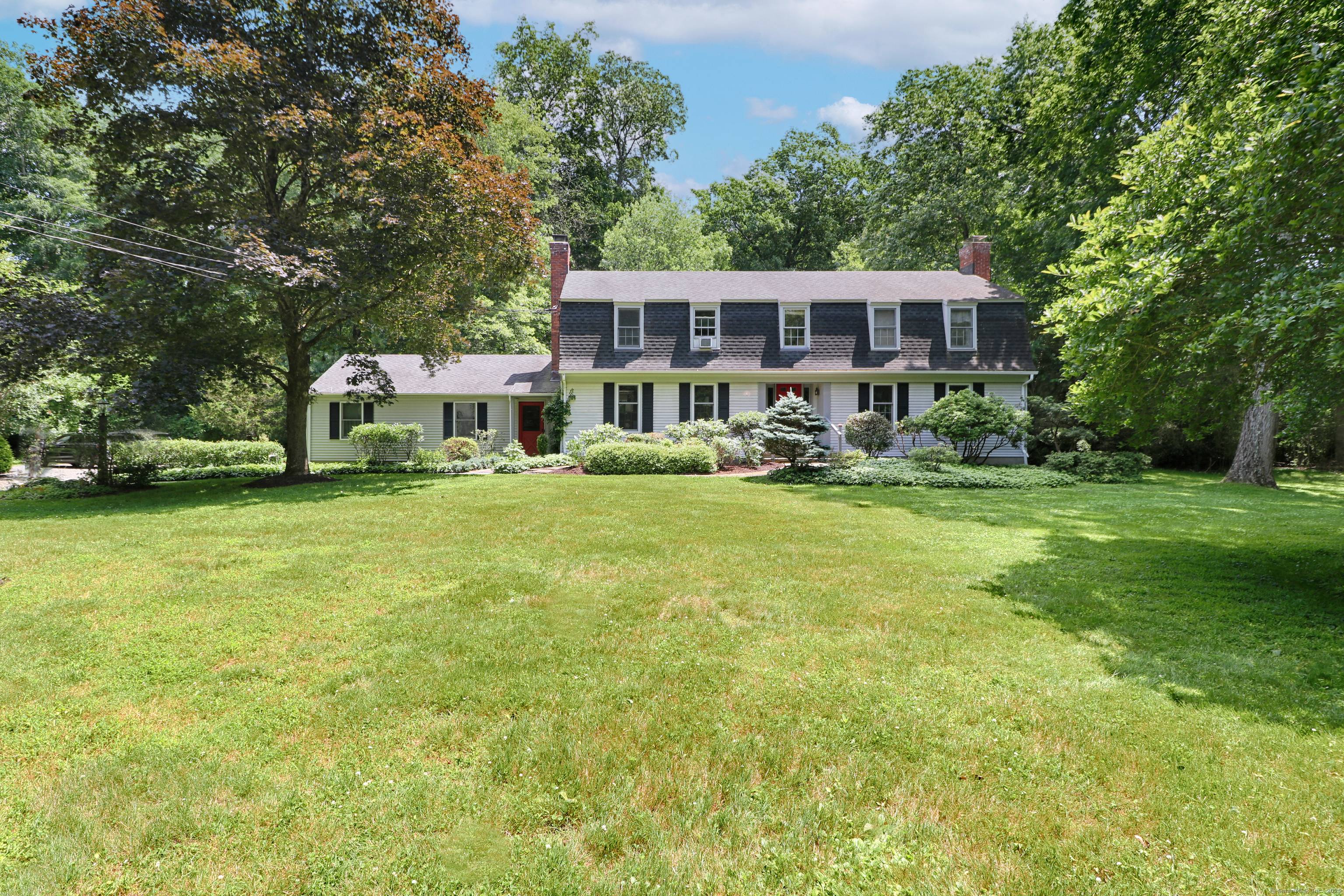 A prime Southport country setting at the Westport line is home to this gracious five bedroom colonial featuring a rarely found attached main level IN LAW AU PAIR APARTMENT with ...