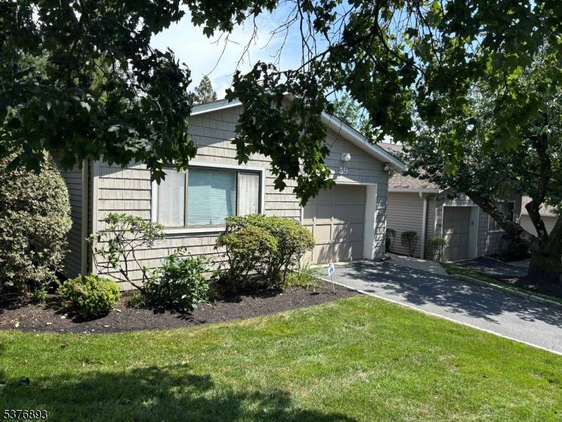 Tucked away in a quiet, private enclave of West Orange is this rare 3 Bedroom, 2 Bath Ranch Condo in Briar Hill Villas.