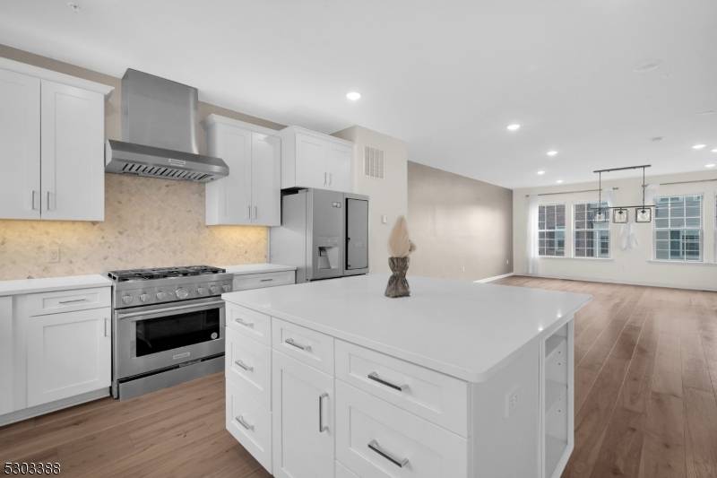 Experience luxury, comfort, and smart living in this beautifully updated end unit townhome, ideally located in the prestigious Livingston Square community in Livingston, NJ.