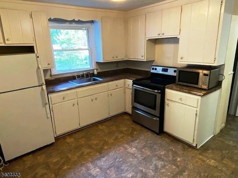 Fully Rented Legal 3 Family with Great Cash Flow, Minutes From Major Highways and NJ Largest Lake.