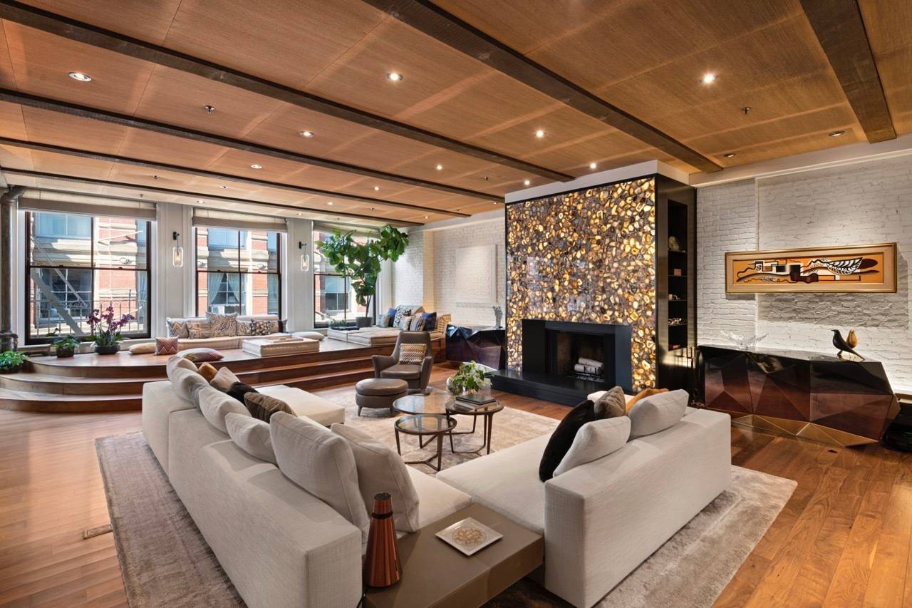 Introducing Unit 4 at 60 Greene Street, an exquisite jewel poised high above the bustling streets of SoHo.