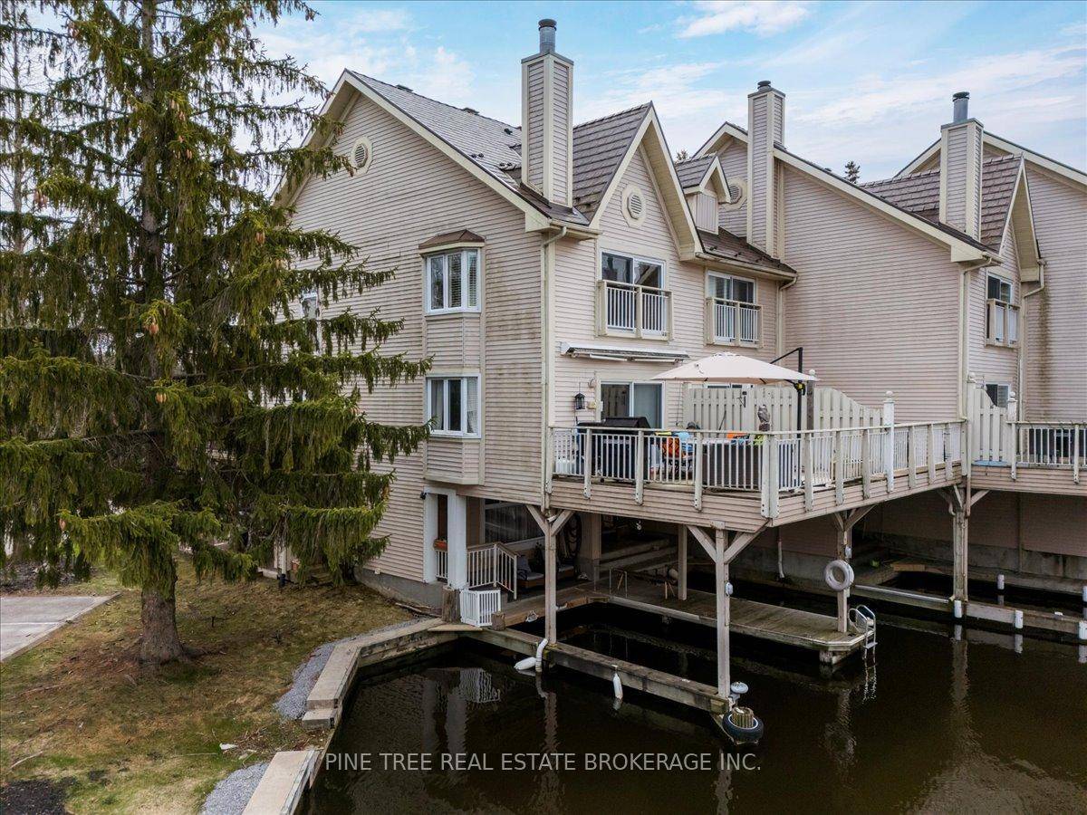 Wow ! This stunning end unit waterfront 3 storey condo townhouse in Lagoon City is renovated from top to bottom with high end finishes.