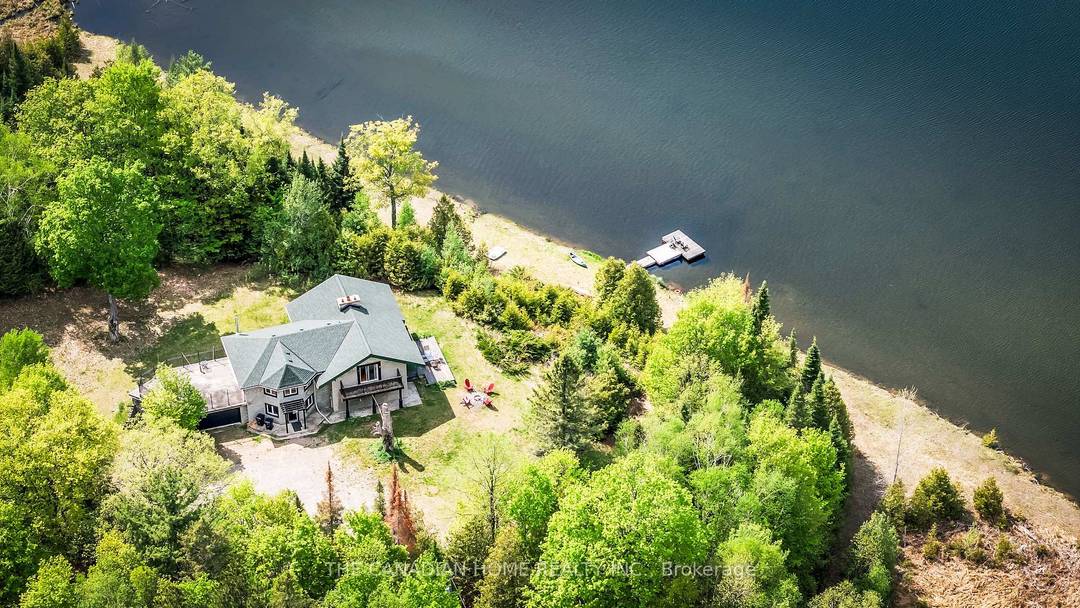 Welcome to 5451 Arden Road, Central Frontenac a rare opportunity to own 174 acres of private waterfront paradise featuring your own spring fed lake, private dock, waterfront patio, and endless ...