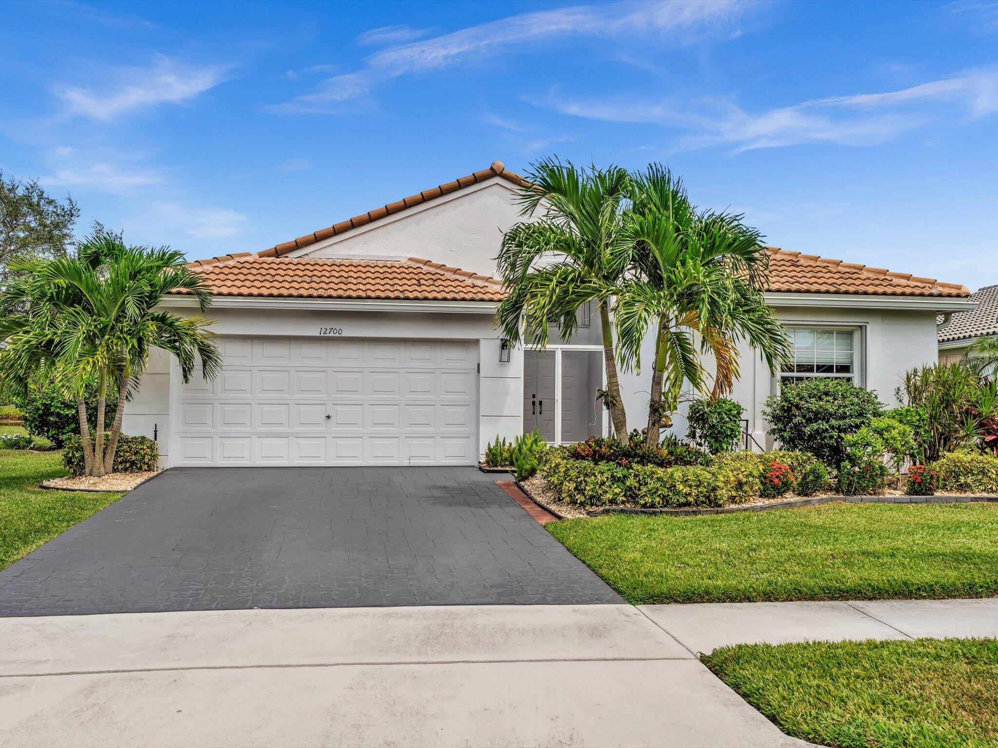 FULLY RENOVATED Grand Palm model with NEW ROOF situated on one of Regency Cove's S.