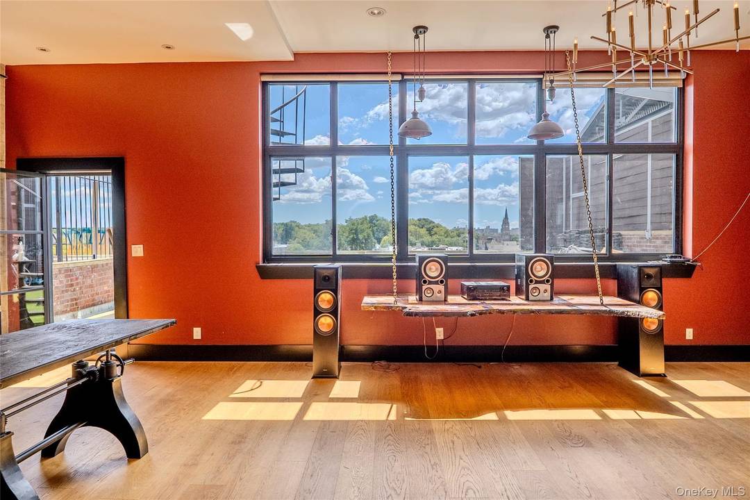 Prime Greenpoint Commercial Condo with Sunlit Loft Space and Large Outdoor Private Patio for Sale.