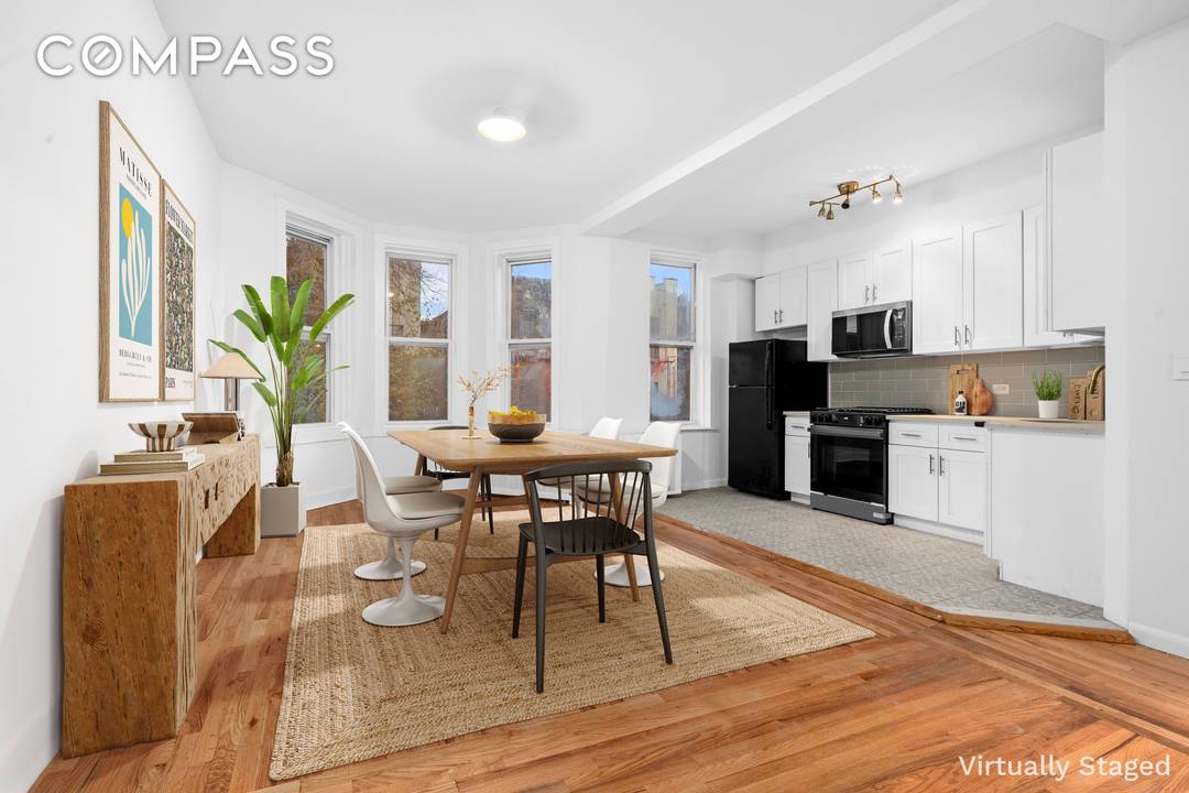 Welcome to 339 E 29th St, a beautifully renovated brick two family unit currently serving as an owner s duplex and a two bedroom rental on the upper floor.