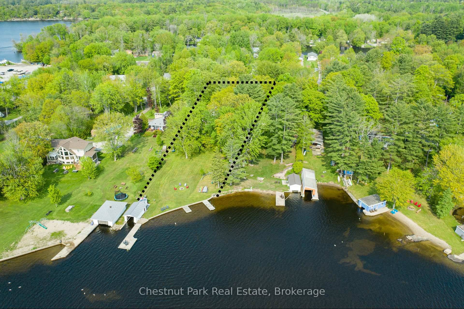HIGHLY COVETED SPARROW LAKE SUNSET SHORE LAKEHOUSE with easy year round, paved municipal road access.