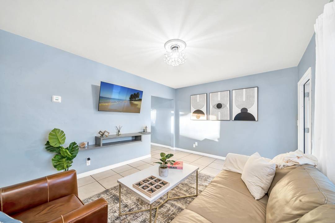 Fully furnished and remodeled classic, one story, 2BR 1BA beach home offered as a Seasonal or Annual Rental.