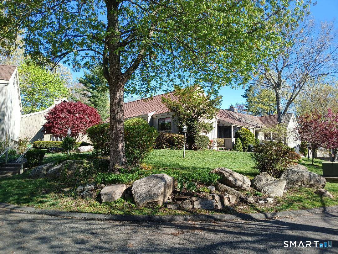 Sought after renovated Wolcott style unit within the acclaimed 55 Oronoque Village.