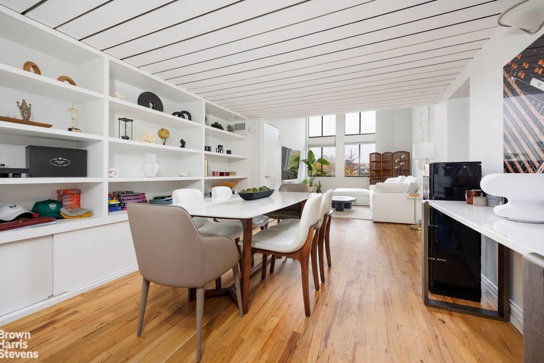 Classic duplex loft with open east exposures is a perfect start to describing this spacious and dramatic 1 bedroom, 1.