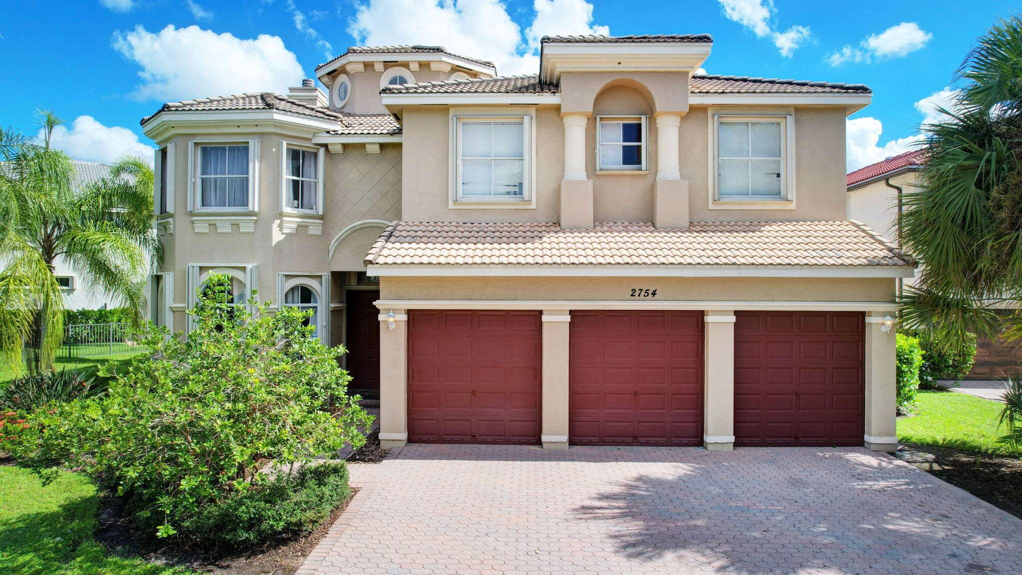 Nestled within the embrace of a tropical paradise in Florida, this Mediterranean inspired residence stands as a regal testament to luxury living.