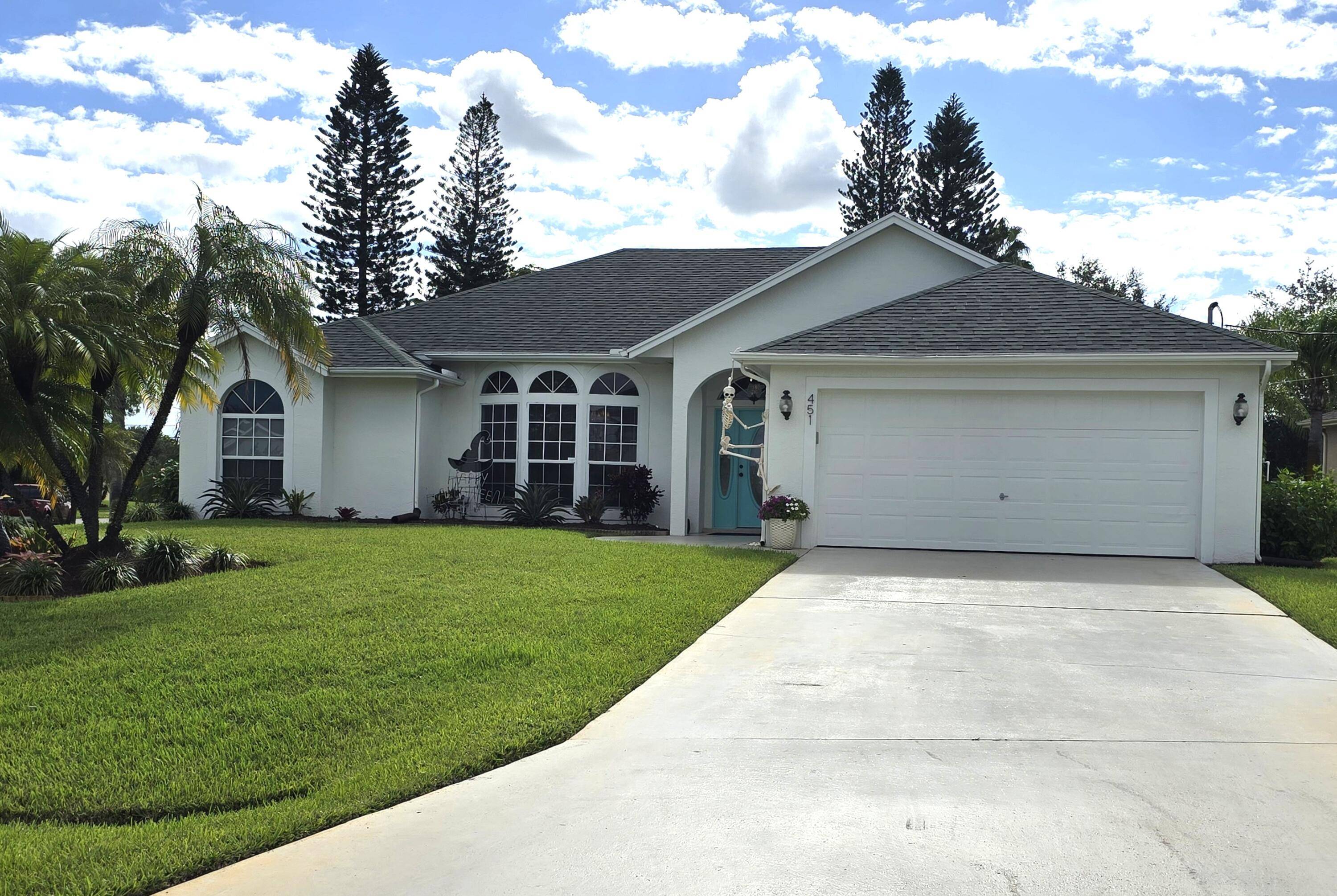 Welcome to this beautifully maintained 3 bedroom, 2 bath home, filled with natural light and designed for comfortable Florida living.