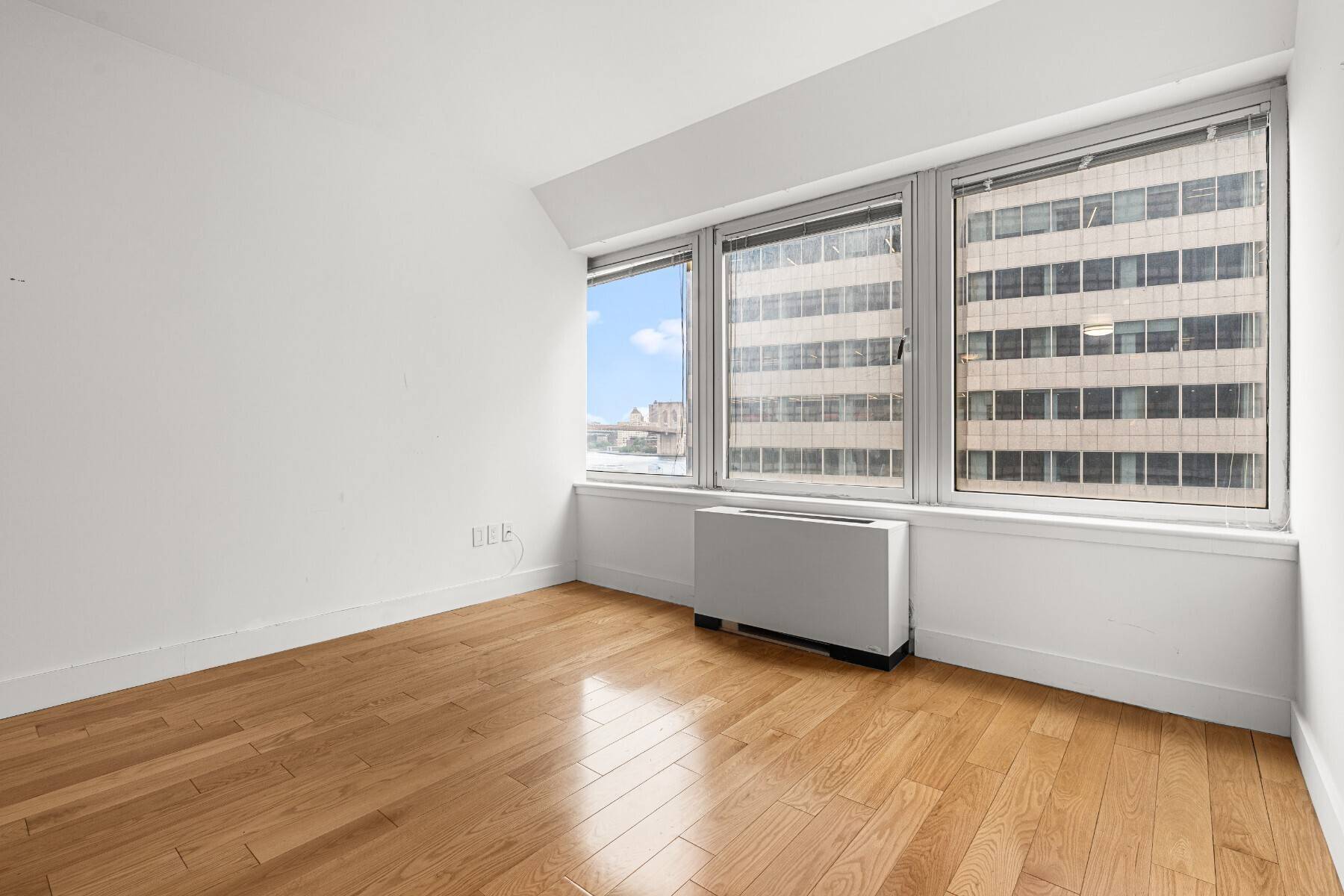 Spacious River View Studio in Full Service High Rise No Broker Fee Experience elevated living at 200 Water Street in this spacious studio apartment with stunning river and bridge views.