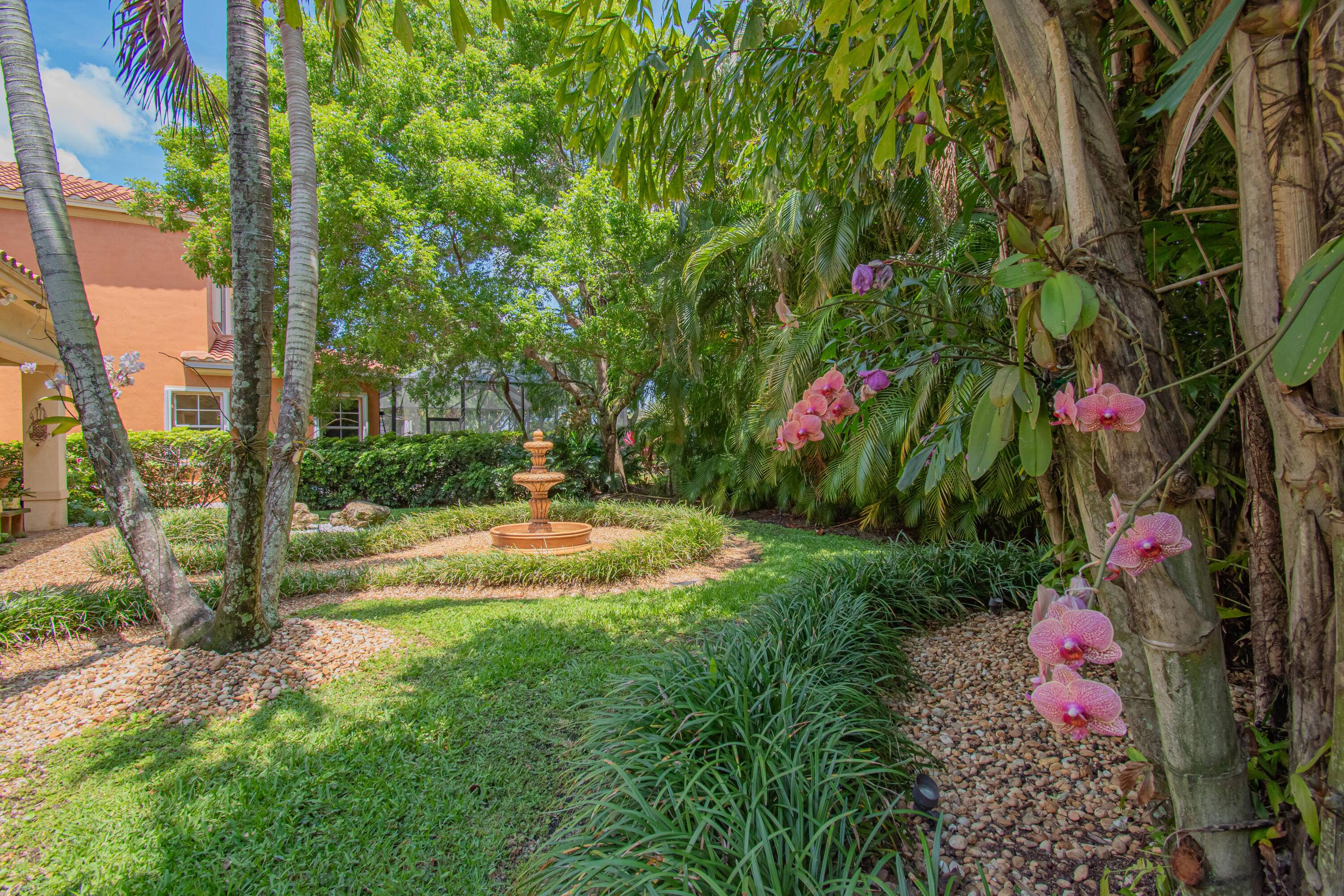 This home makes great use of the view of the private tropical backyard and spacious 400 sf patio.