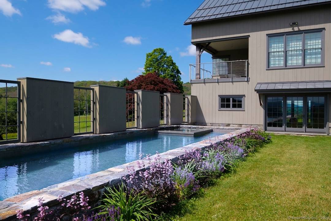 Architectural Mountain View Estate on 39 Acres and Infinity Pool Magnificent architectural gem showcases breathtaking Berkshire Mountain panoramas from nearly every room.