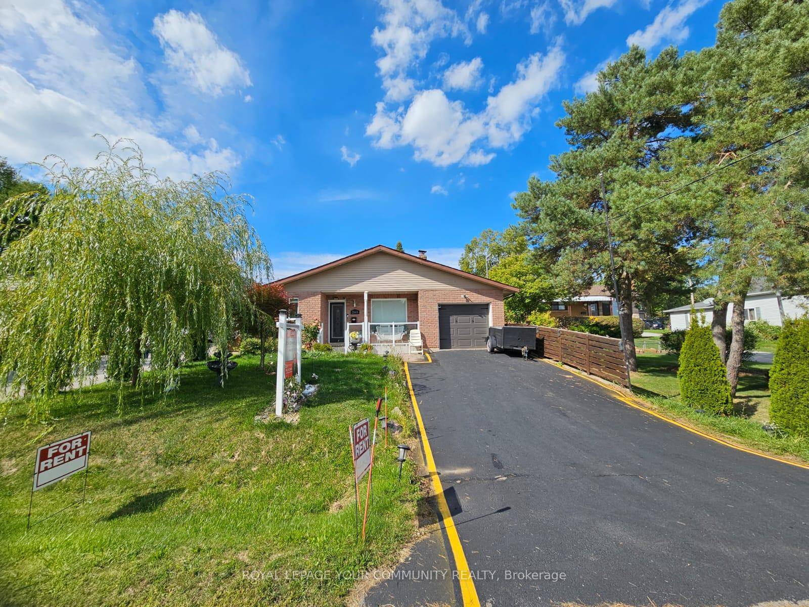 Discover this beautifully renovated, sun filled bungalow nestled in the heart of South Keswick.