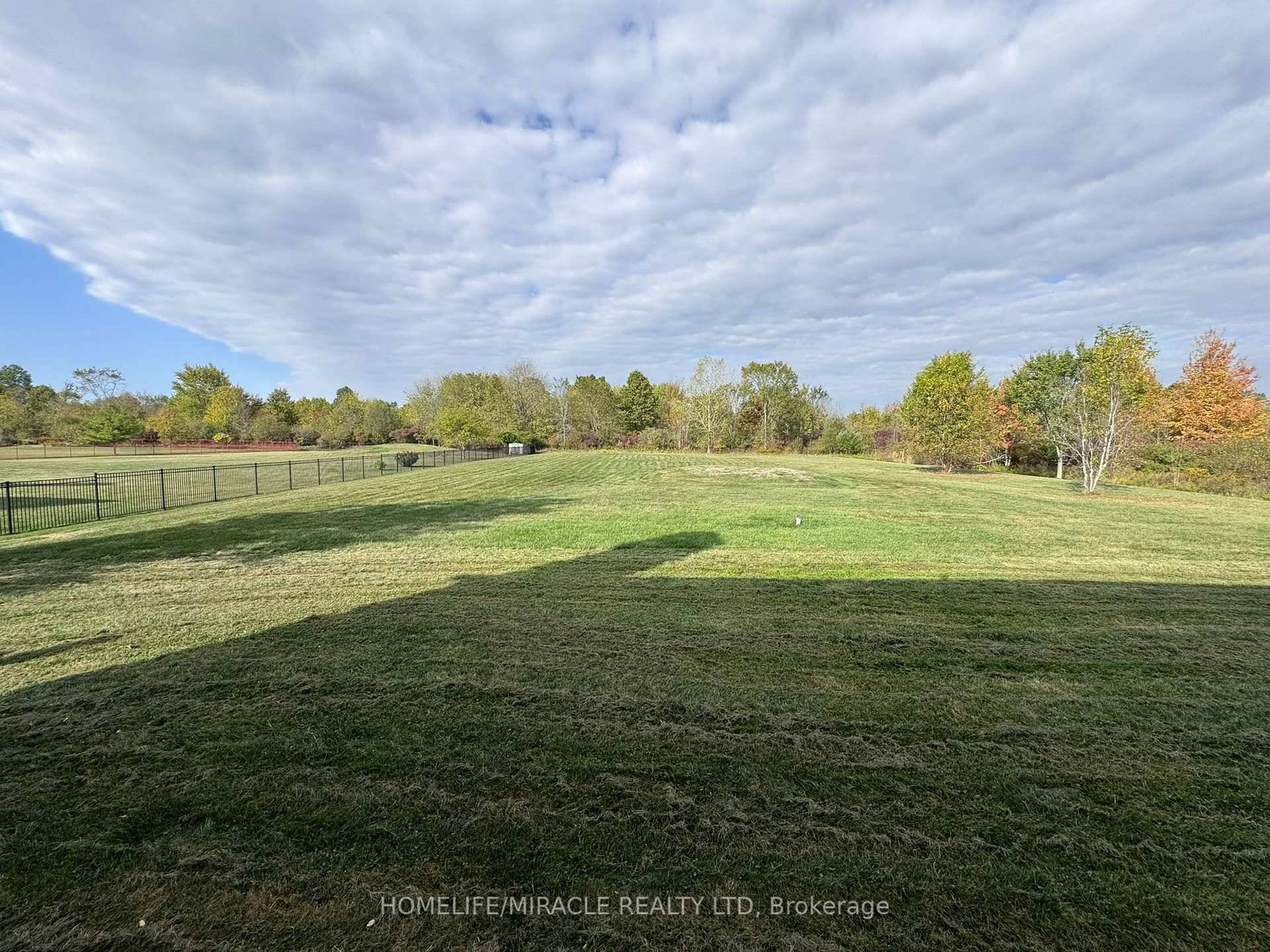 Exquisite 4 Bedroom Waterfront Retreat in Lyons Creek Community stunning 3, 500 sq.