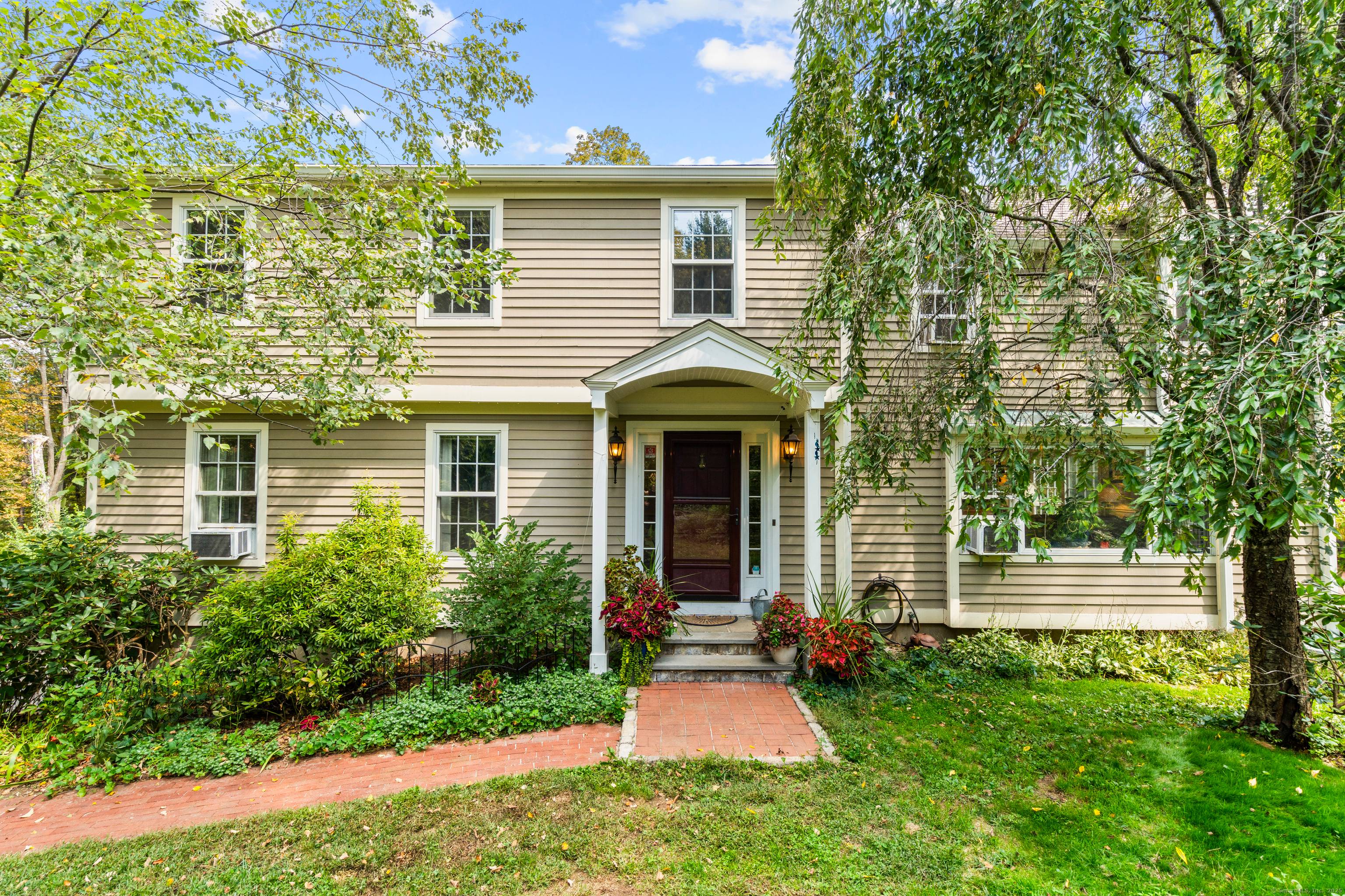 Welcome home ! This splendid four bedroom Colonial home is tucked away, set on 2 acres in Sandy Hook, surrounded by nature.