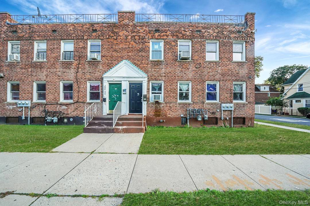 Welcome to this exceptional two family brick corner residence located in the heart of St.
