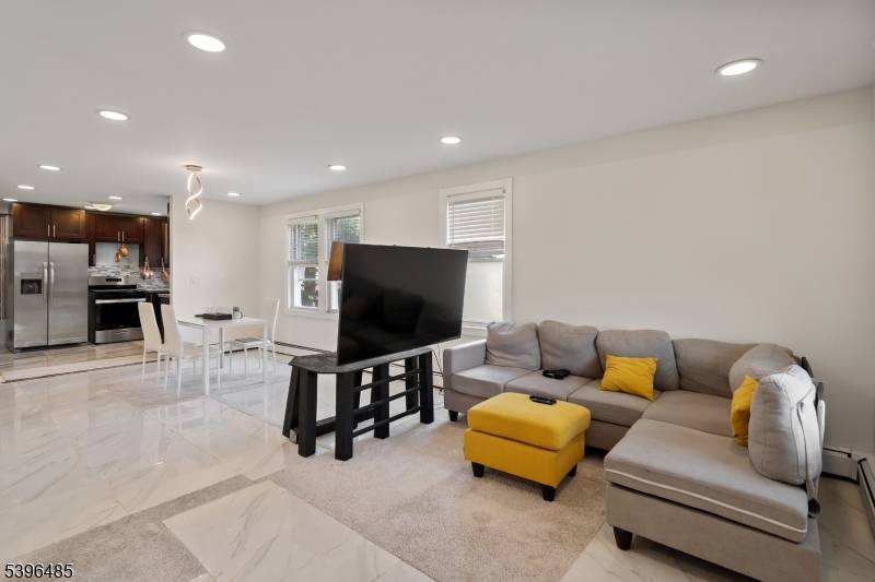 Renovated in 2023 ! Stunning 4 bedroom, 2 bath single family home in the Hopelawn section of Woodbridge.