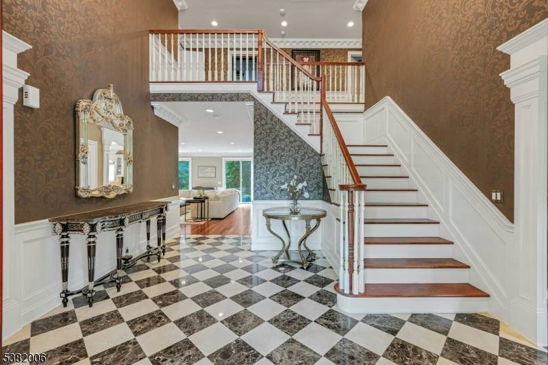 Welcome to this stunning custom Colonial, perfectly situated in one of Short Hills' most sought after neighborhoods just moments from everything Millburn has to offer.