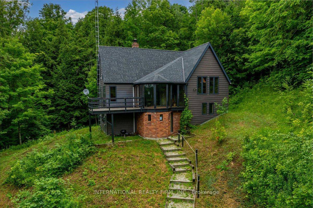 Paradise In The Woods... A Magical Place that is private, spacious and bright.