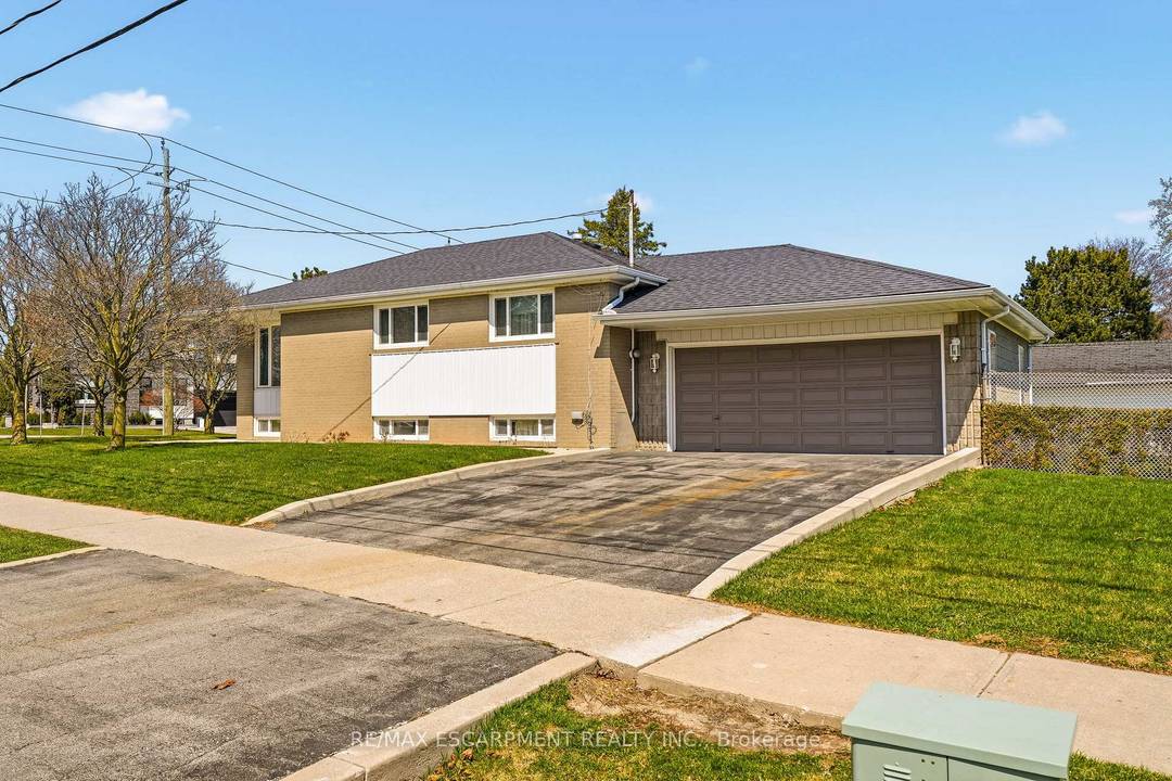 Welcome to this well maintained 4 bedroom, 2 bath bungalow nestled in one of West Oakville's most desirable enclaves.