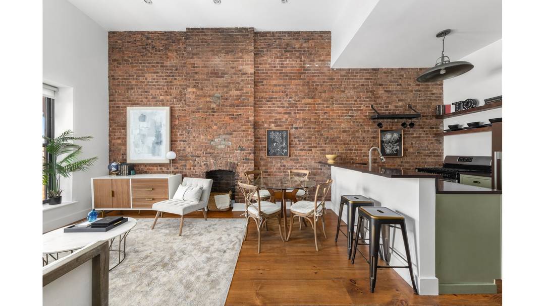 Welcome to loft living ! 13 foot ceilings, oversized windows, exposed brick, and a quintessential industrial Brooklyn vibe.