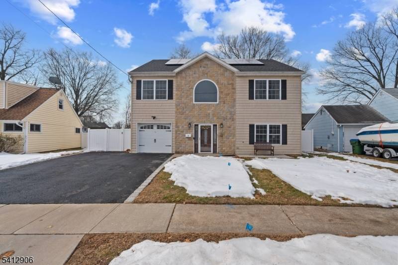 Welcome to this spectacular Northeast facing new construction built on an existing foundation, offering 5 bedrooms and 3 full baths with exceptional craftsmanship and modern design throughout.