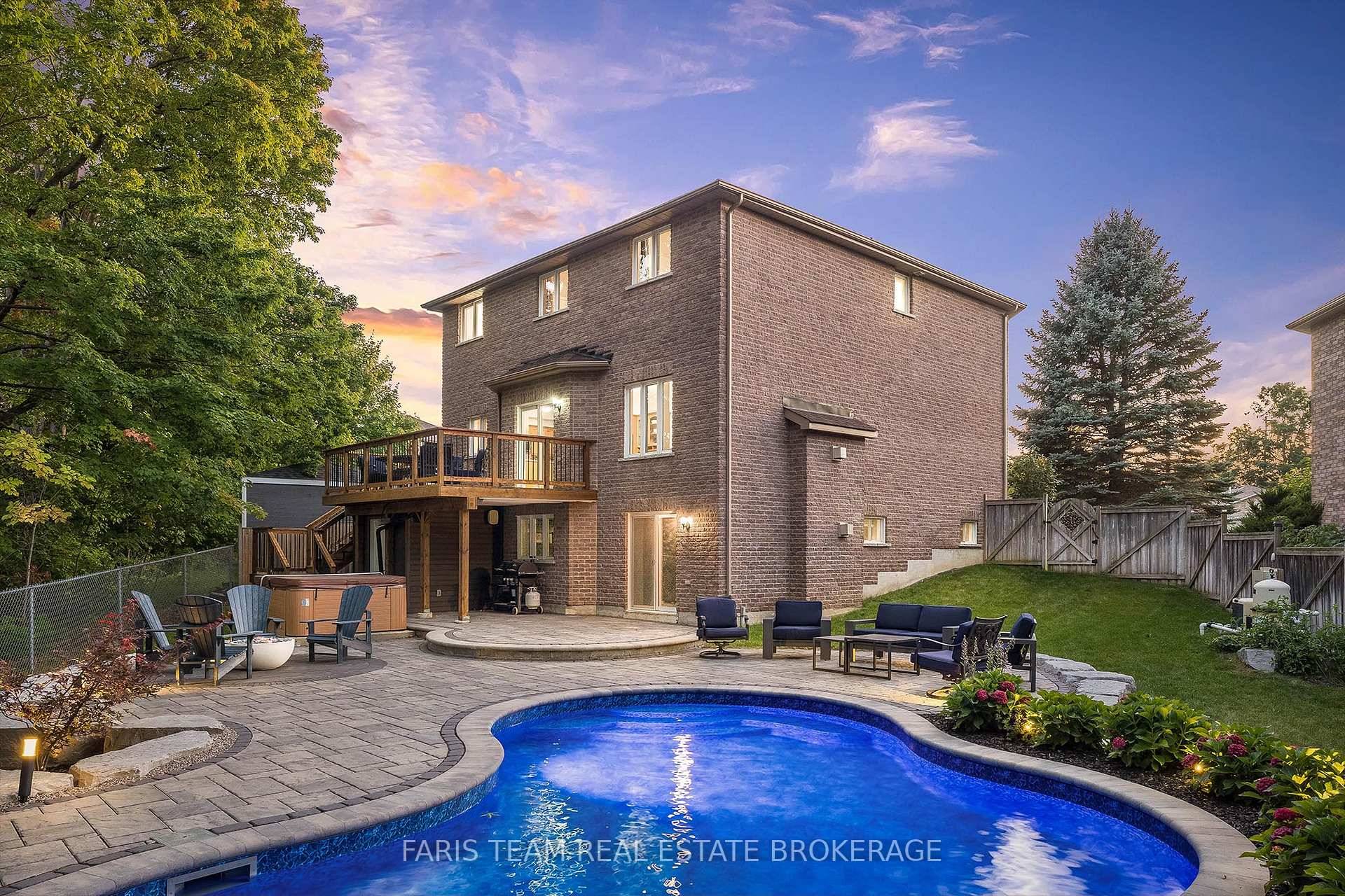 Top 5 Reasons You Will Love This Home 1 Escape to your own backyard paradise with an inground saltwater pool, stone patio, firepit, professional landscaping, a surround sound system, and ...