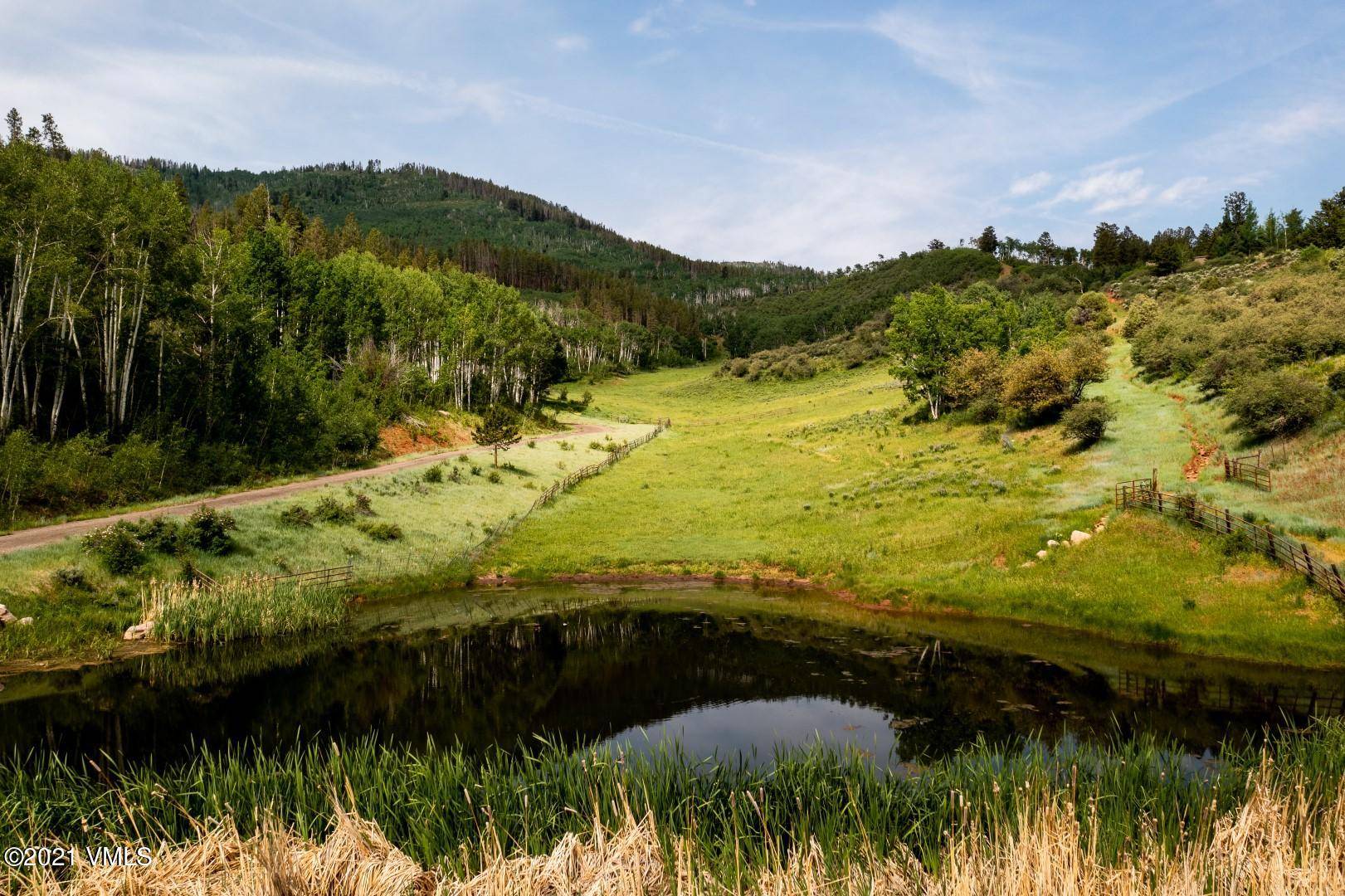 An exceptional luxury estate offering rarely seen opportunity to have a variety of build sites ideal to construct multiple primary homes on 35 acre lots.