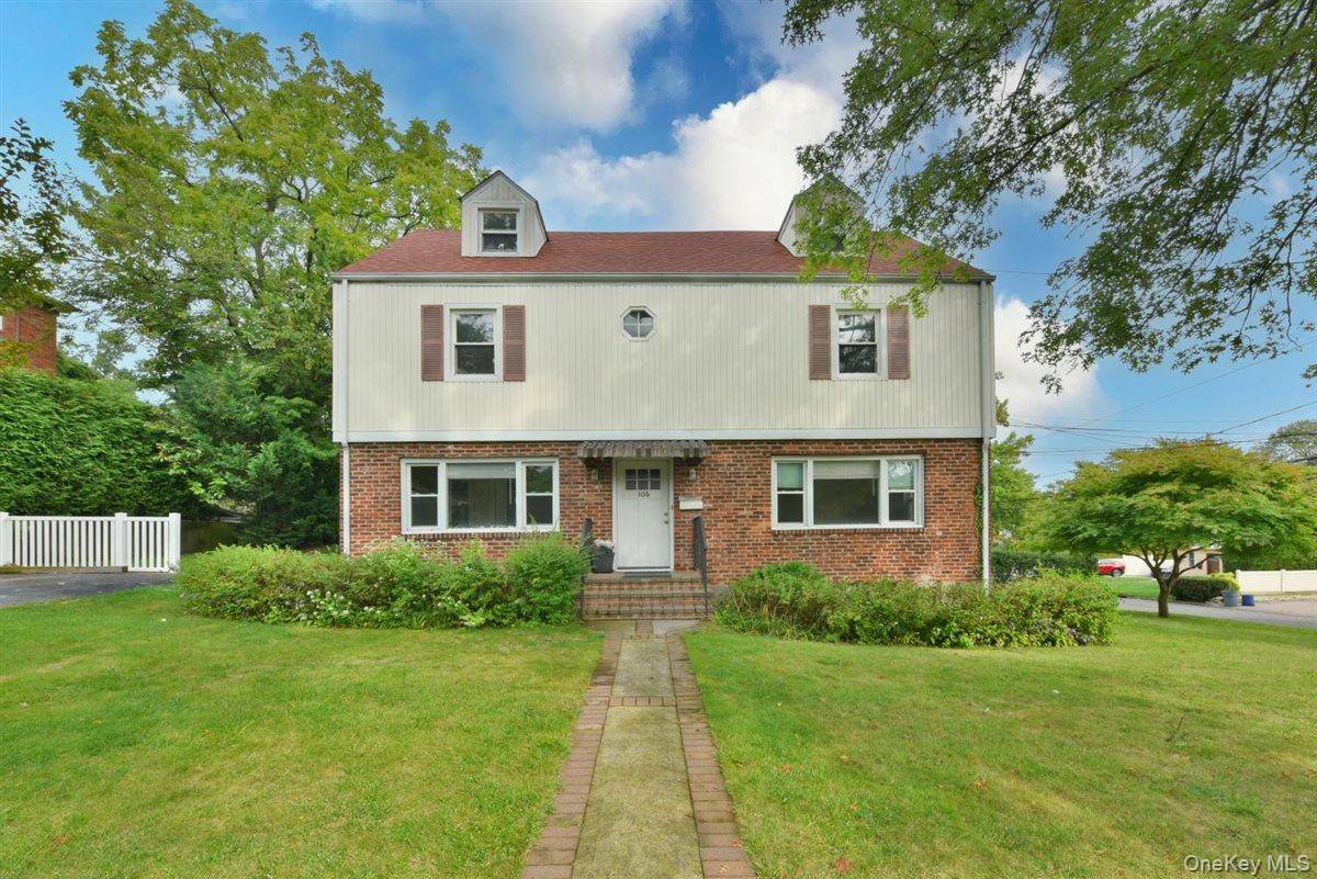 Set on a quiet street in Great Neck, this home brings space, flexibility, and the chance to make it your own.