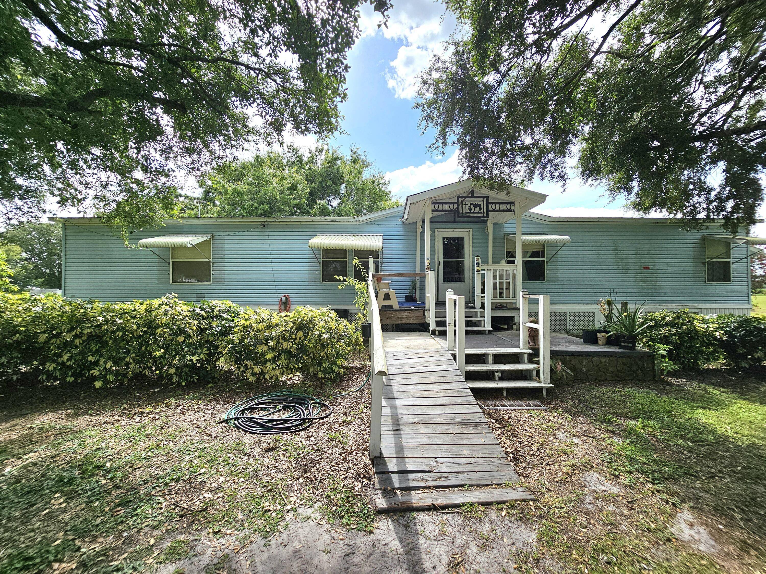 OTTER CREEK Charming DWMH PLUS a country setting PARADISE fully fenced and gated !