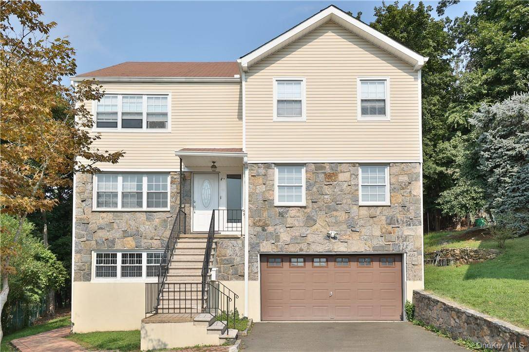 Discover a stunning multi family home nestled on a serene cul de sac in the highly sought after Ridge Estate community.