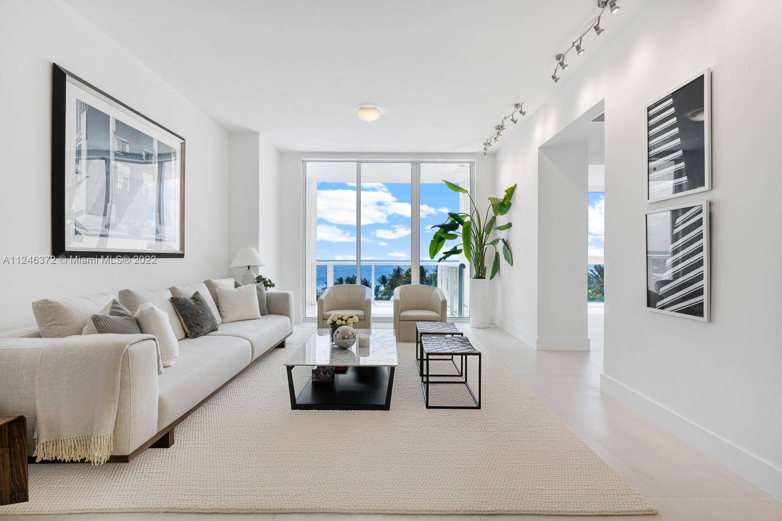 Step Inside With Me ! This direct oceanfront modern residence represents a rare 2 Bedroom Den, 3 full baths floorplan in Continuum s North Tower.